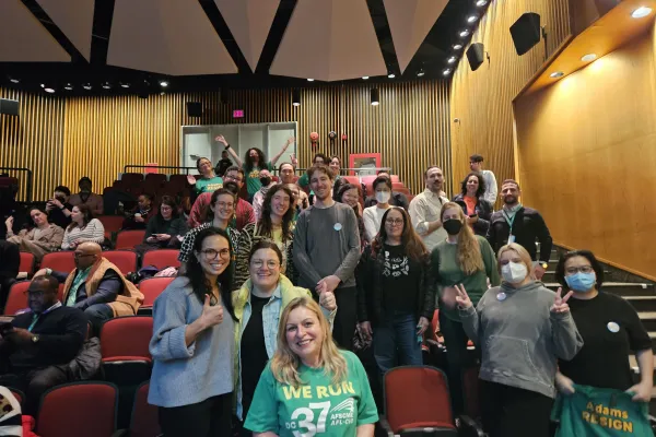 Local 3005 Members at the 2025 Mayoral forum wearing green shirts