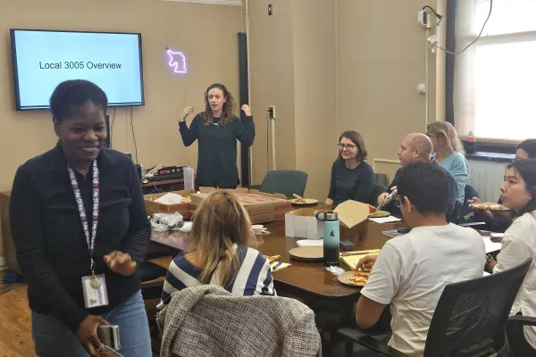Local 3005 Members at shop steward meeting listening to trainer at the front of the room