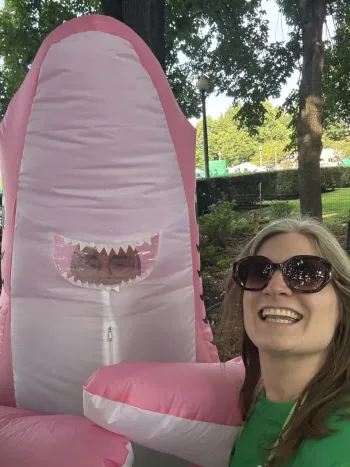 2 people, 1 in shark costume